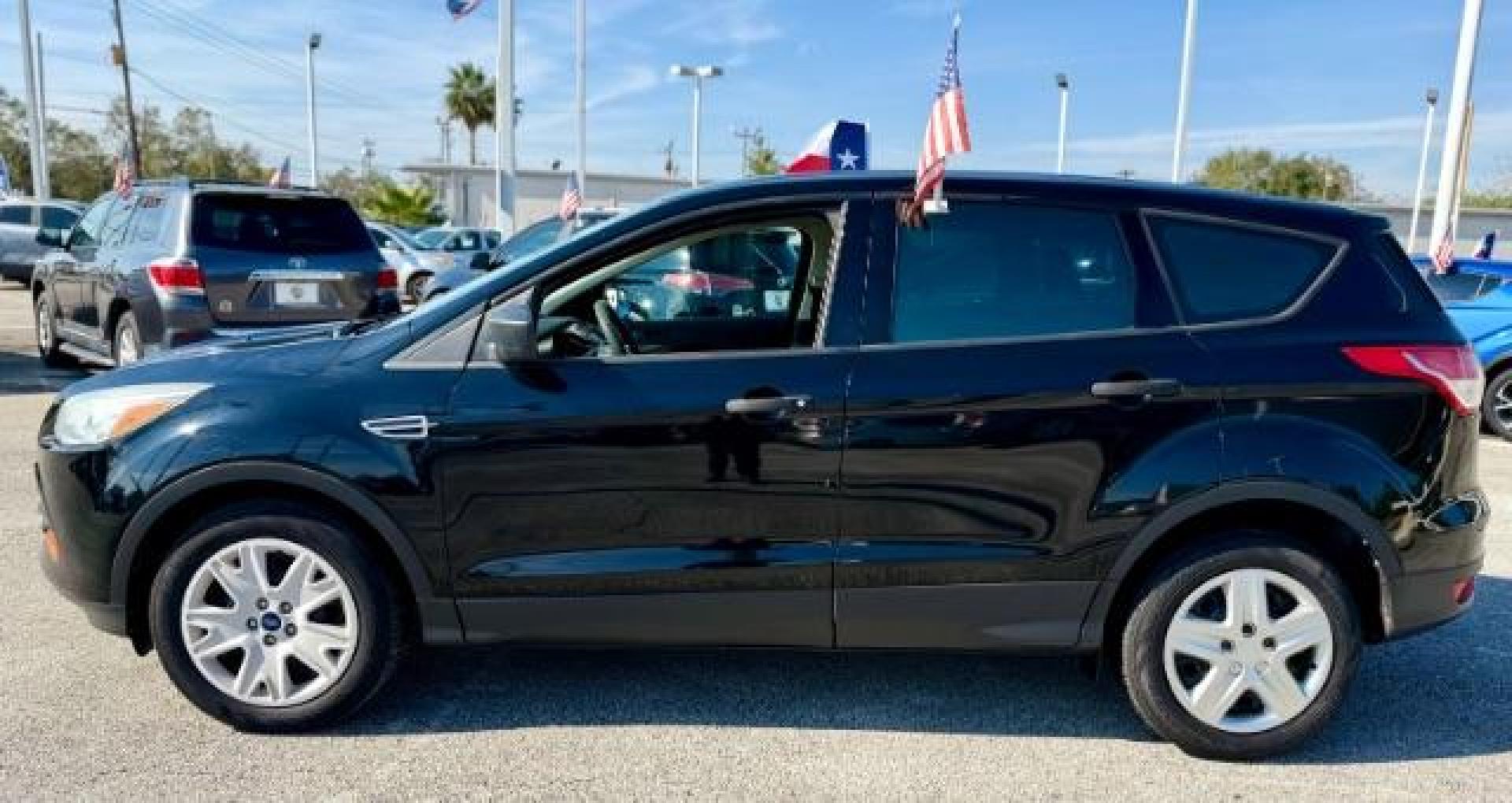 2016 Shadow Black Ford Escape S FWD (1FMCU0F77GU) with an 2.5L L4 DOHC 16V engine, 6-Speed Automatic transmission, located at 4545 Spencer Hwy., Pasadena, 77504, (832) 266-1645, 29.666037, -95.173775 - Photo#2