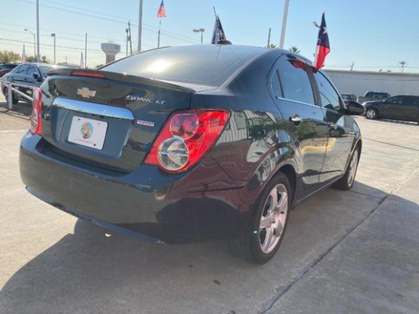 2015 Ashen Gray Metallic Chevrolet Sonic LTZ Auto Sedan (1G1JE5SB4F4) with an 1.4L L4 DOHC 24V TUR engine, 6-Speed Automatic transmission, located at 4545 Spencer Hwy., Pasadena, 77504, (832) 266-1645, 29.666037, -95.173775 - Photo#2