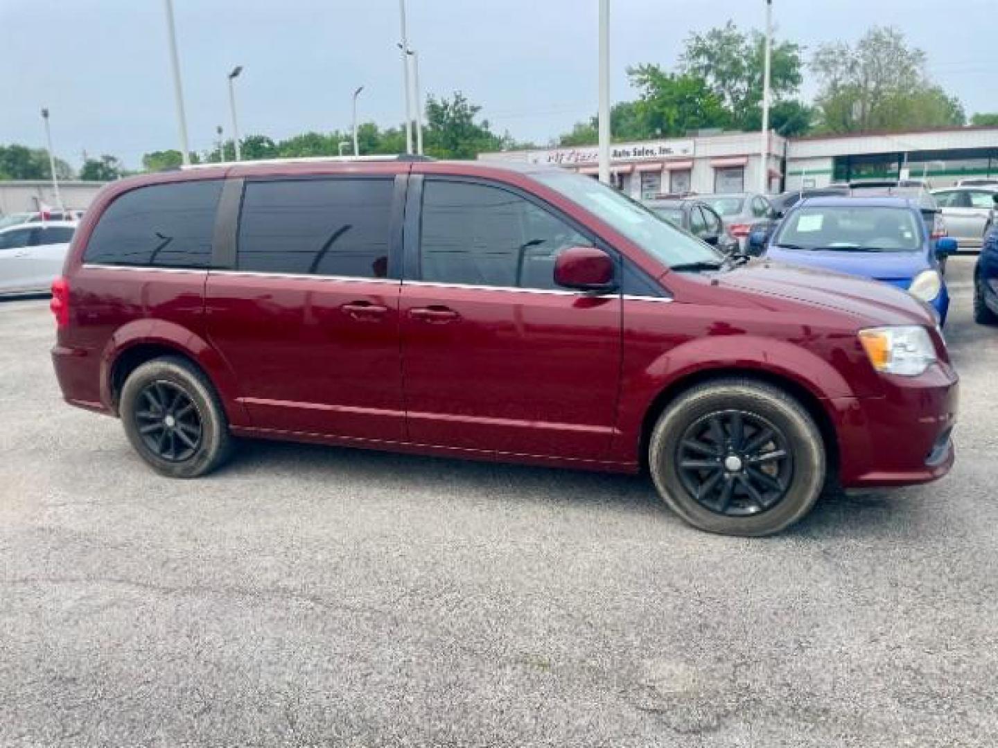 2018 Octane Red Pearl Coat /Black, leather/sueded microfiber Dodge Grand Caravan SXT (2C4RDGCG4JR) with an 3.6L V6 DOHC 24V engine, 6-Speed Automatic transmission, located at 4545 Spencer Hwy., Pasadena, 77504, (832) 266-1645, 29.666037, -95.173775 - Photo#2