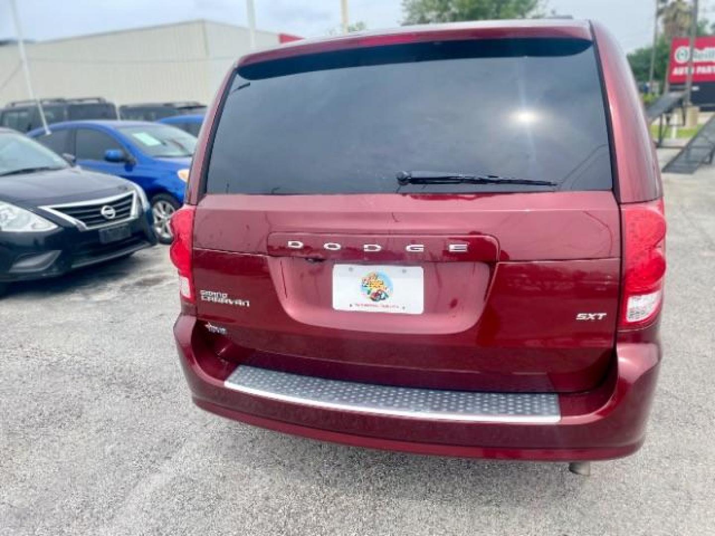 2018 Octane Red Pearl Coat /Black, leather/sueded microfiber Dodge Grand Caravan SXT (2C4RDGCG4JR) with an 3.6L V6 DOHC 24V engine, 6-Speed Automatic transmission, located at 4545 Spencer Hwy., Pasadena, 77504, (832) 266-1645, 29.666037, -95.173775 - Photo#3