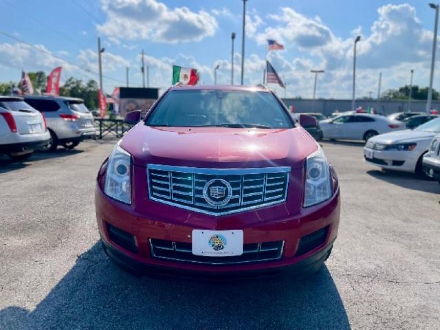 2013 Crystal Red Tintcoat Cadillac SRX AWD Luxury Collectio (3GYFNGE37DS) with an 3.6L V6 DOHC 24V FFV engine, 6-Speed Automatic transmission, located at 4545 Spencer Hwy., Pasadena, 77504, (832) 266-1645, 29.666037, -95.173775 - Photo#0