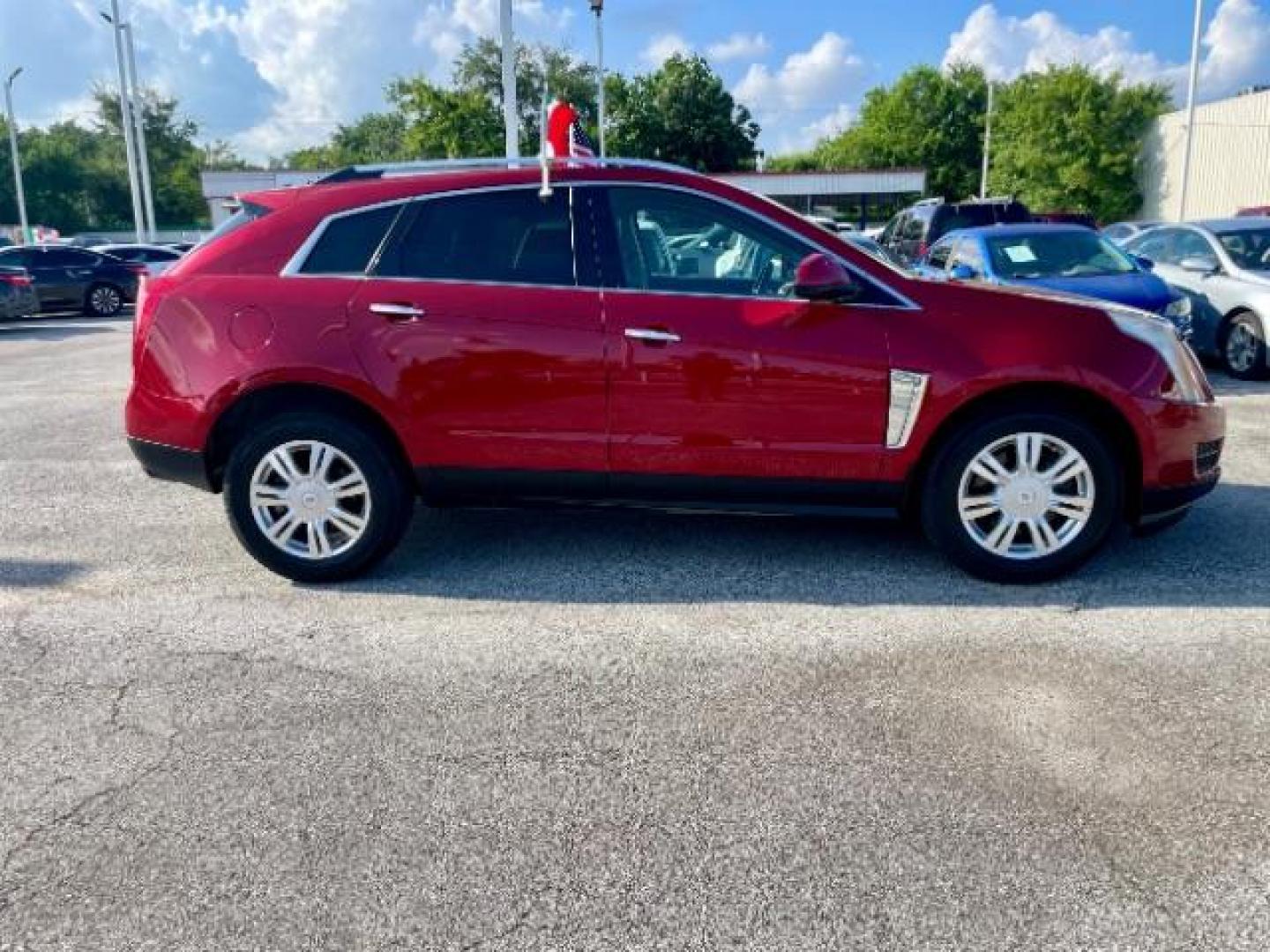 2013 Crystal Red Tintcoat Cadillac SRX AWD Luxury Collectio (3GYFNGE37DS) with an 3.6L V6 DOHC 24V FFV engine, 6-Speed Automatic transmission, located at 4545 Spencer Hwy., Pasadena, 77504, (832) 266-1645, 29.666037, -95.173775 - Photo#1