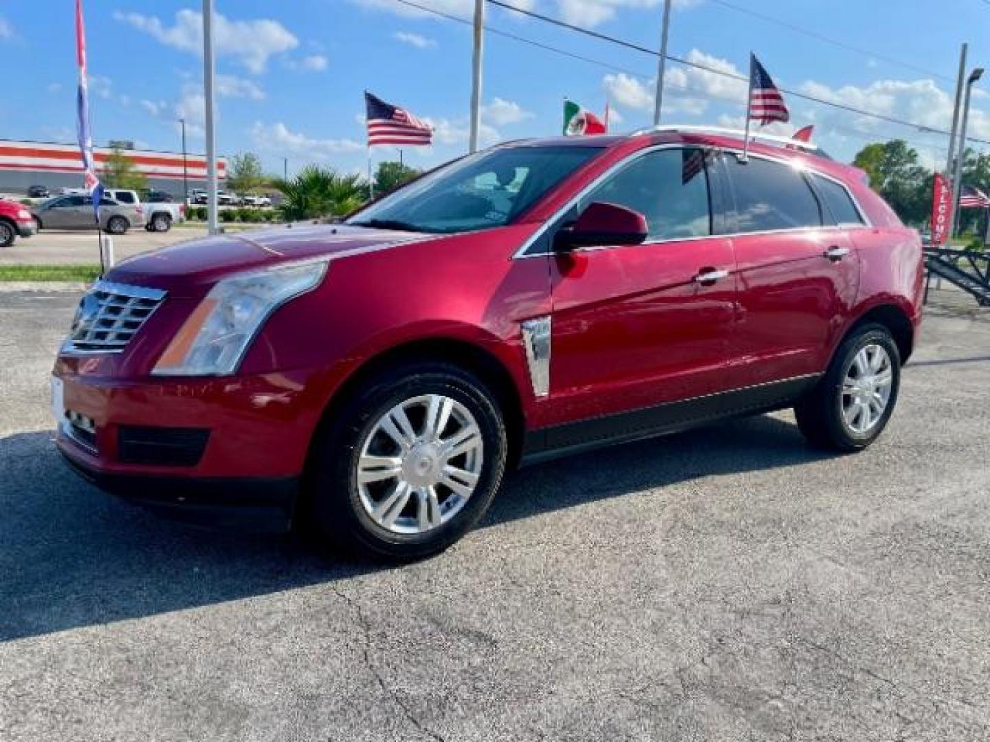 2013 Crystal Red Tintcoat Cadillac SRX AWD Luxury Collectio (3GYFNGE37DS) with an 3.6L V6 DOHC 24V FFV engine, 6-Speed Automatic transmission, located at 4545 Spencer Hwy., Pasadena, 77504, (832) 266-1645, 29.666037, -95.173775 - Photo#4