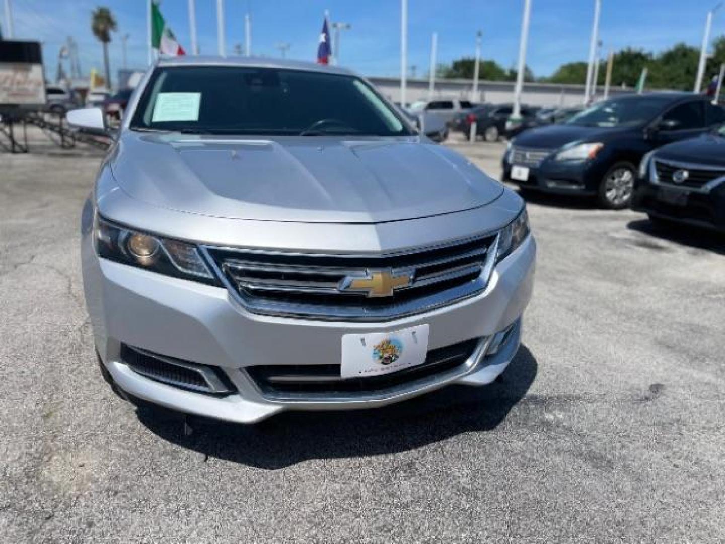 2015 Silver Ice Metallic /Brownstone/Jet Black Chevrolet Impala 2LT (1G1125S35FU) with an 3.6L V6 DOHC 24V engine, 6-Speed Automatic transmission, located at 4545 Spencer Hwy., Pasadena, 77504, (832) 266-1645, 29.666037, -95.173775 - Photo#1