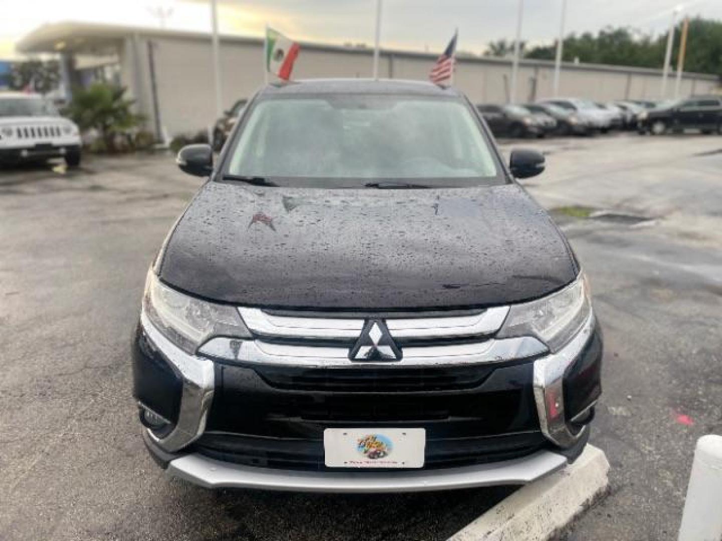 2016 Labrador Black /Black, cloth Mitsubishi Outlander SE 2WD (JA4AD3A30GZ) with an 2.4L L4 DOHC 16V engine, Continuously Variable Transmission transmission, located at 4545 Spencer Hwy., Pasadena, 77504, (832) 266-1645, 29.666037, -95.173775 - Photo#0