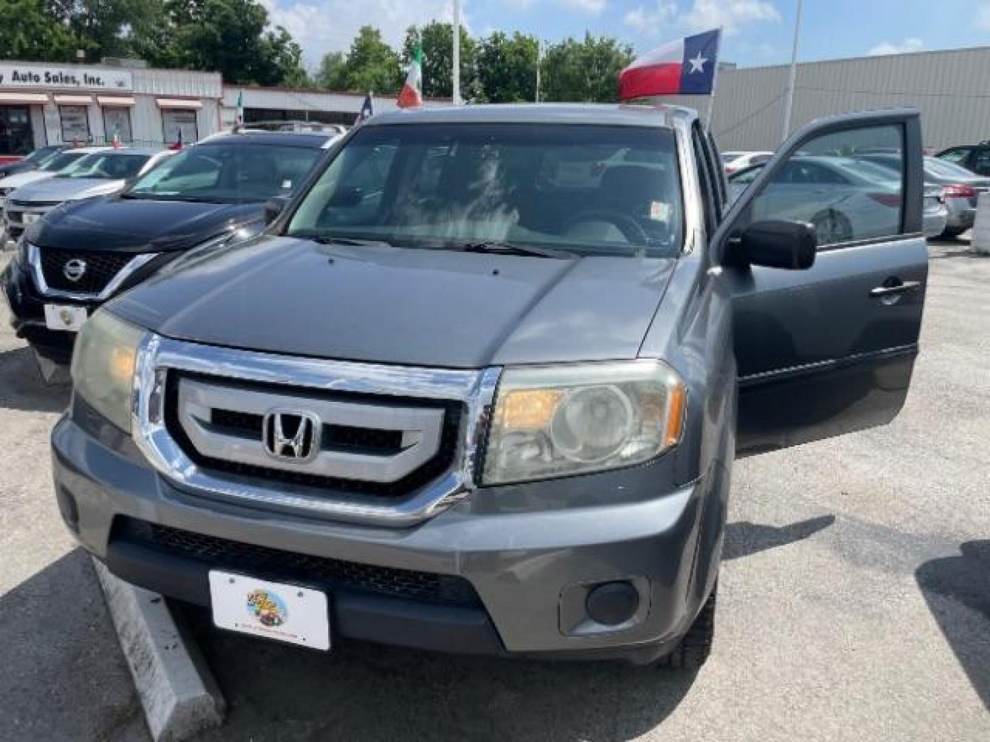 2009 Sterling Gray Metallic Honda Pilot LX 2WD (5FNYF38249B) with an 3.5L V6 SOHC 24V engine, 5-Speed Automatic transmission, located at 4545 Spencer Hwy., Pasadena, 77504, (832) 266-1645, 29.666037, -95.173775 - Photo#0