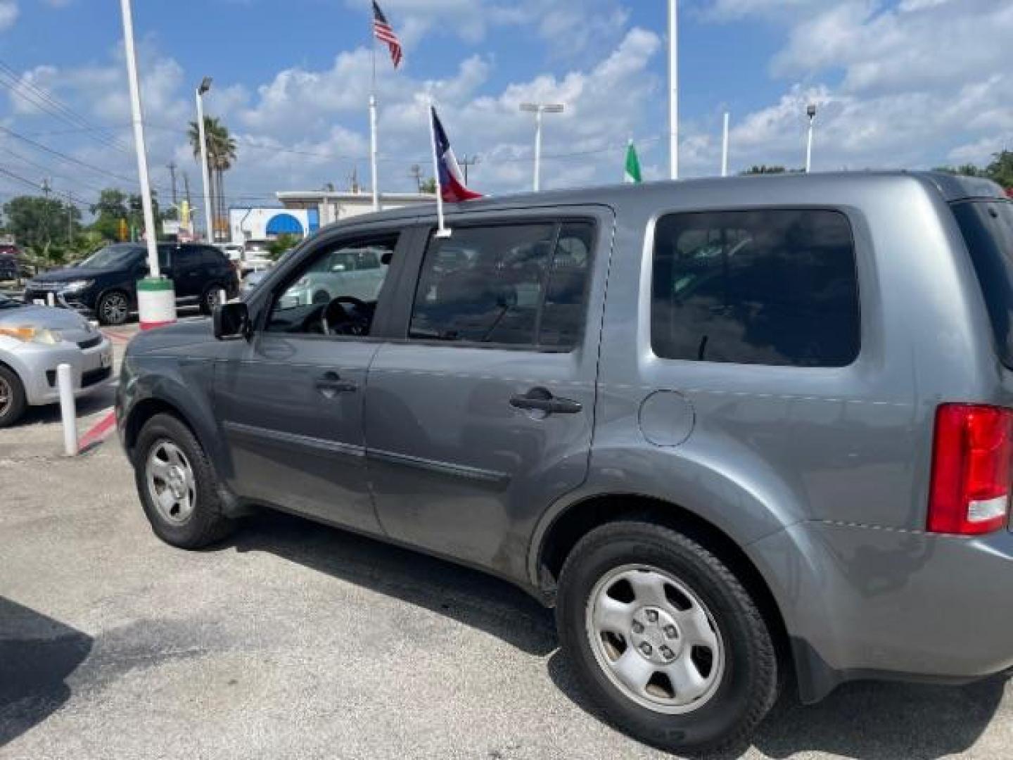 2009 Sterling Gray Metallic Honda Pilot LX 2WD (5FNYF38249B) with an 3.5L V6 SOHC 24V engine, 5-Speed Automatic transmission, located at 4545 Spencer Hwy., Pasadena, 77504, (832) 266-1645, 29.666037, -95.173775 - Photo#1