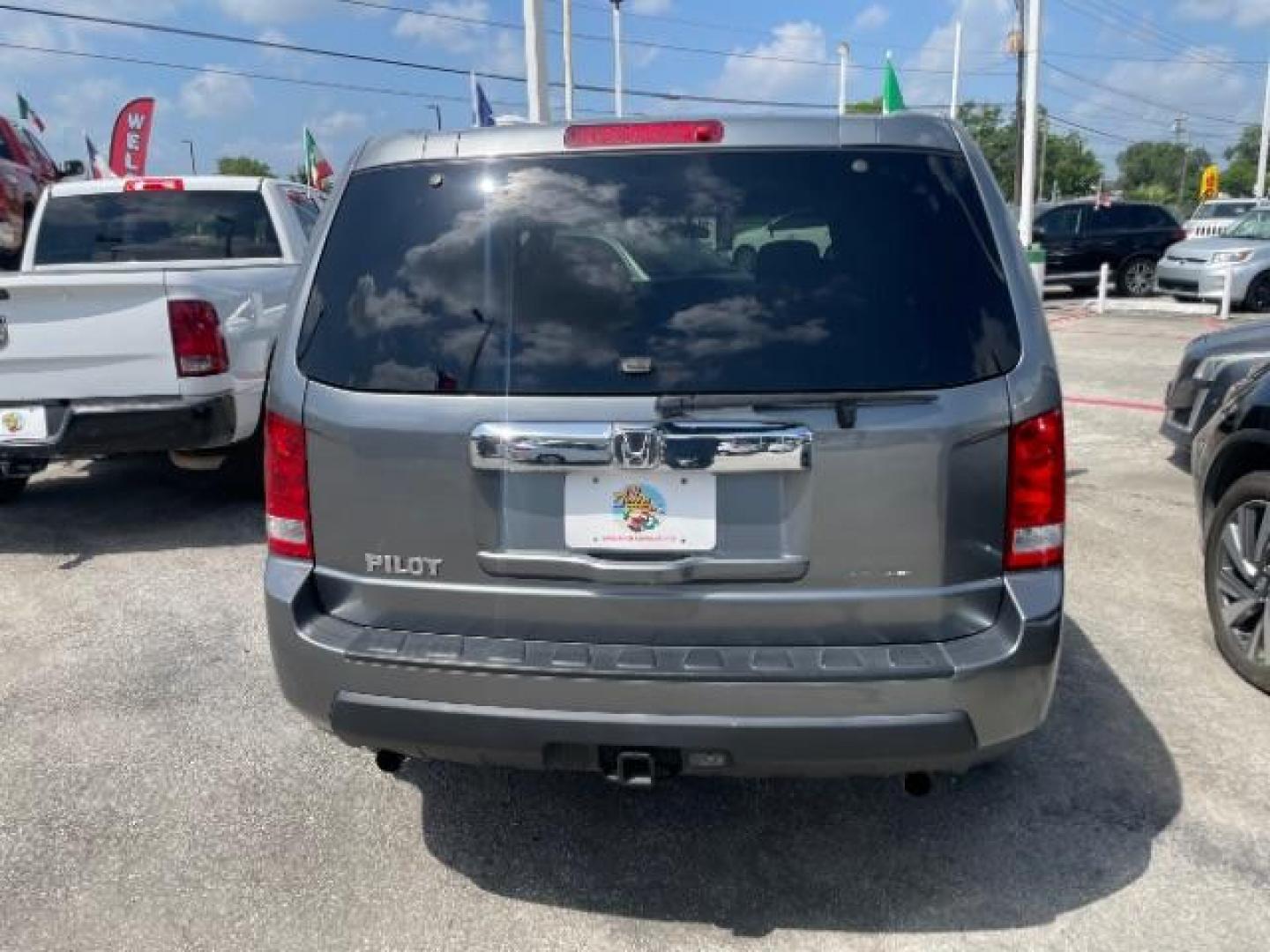 2009 Sterling Gray Metallic Honda Pilot LX 2WD (5FNYF38249B) with an 3.5L V6 SOHC 24V engine, 5-Speed Automatic transmission, located at 4545 Spencer Hwy., Pasadena, 77504, (832) 266-1645, 29.666037, -95.173775 - Photo#3