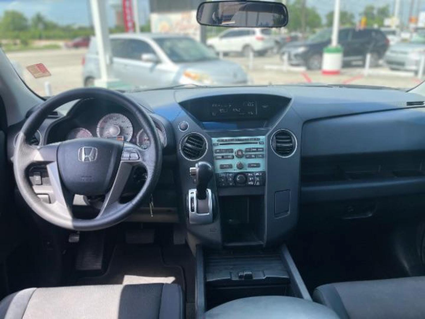 2009 Sterling Gray Metallic Honda Pilot LX 2WD (5FNYF38249B) with an 3.5L V6 SOHC 24V engine, 5-Speed Automatic transmission, located at 4545 Spencer Hwy., Pasadena, 77504, (832) 266-1645, 29.666037, -95.173775 - Photo#4