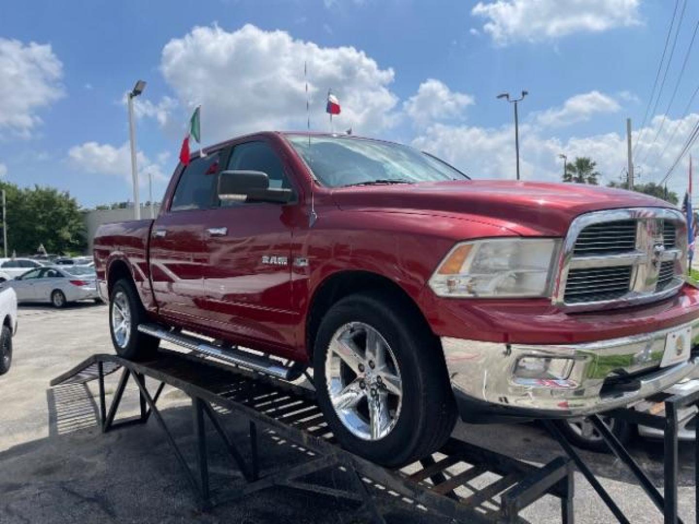 2010 Flame Red RAM 1500 SLT Crew Cab 4WD (1D7RV1CTXAS) with an 5.7L V8 OHV 16V engine, 5-Speed Automatic transmission, located at 4545 Spencer Hwy., Pasadena, 77504, (832) 266-1645, 29.666037, -95.173775 - Photo#0