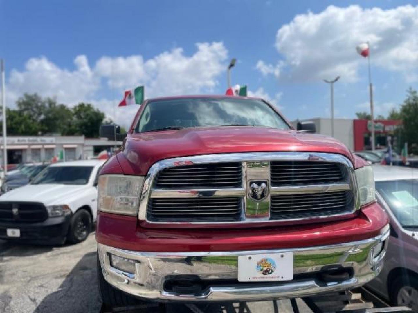 2010 Flame Red RAM 1500 SLT Crew Cab 4WD (1D7RV1CTXAS) with an 5.7L V8 OHV 16V engine, 5-Speed Automatic transmission, located at 4545 Spencer Hwy., Pasadena, 77504, (832) 266-1645, 29.666037, -95.173775 - Photo#1