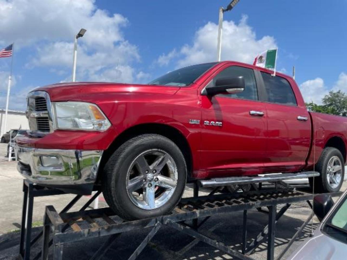 2010 Flame Red RAM 1500 SLT Crew Cab 4WD (1D7RV1CTXAS) with an 5.7L V8 OHV 16V engine, 5-Speed Automatic transmission, located at 4545 Spencer Hwy., Pasadena, 77504, (832) 266-1645, 29.666037, -95.173775 - Photo#2