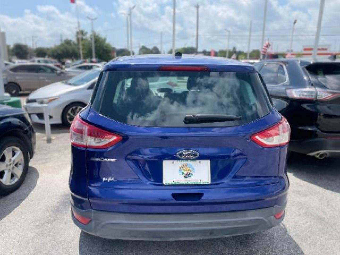 2013 Deep Impact Blue Ford Escape S FWD (1FMCU0F75DU) with an 2.5L L4 DOHC 16V engine, 6-Speed Automatic transmission, located at 4545 Spencer Hwy., Pasadena, 77504, (832) 266-1645, 29.666037, -95.173775 - Photo#2