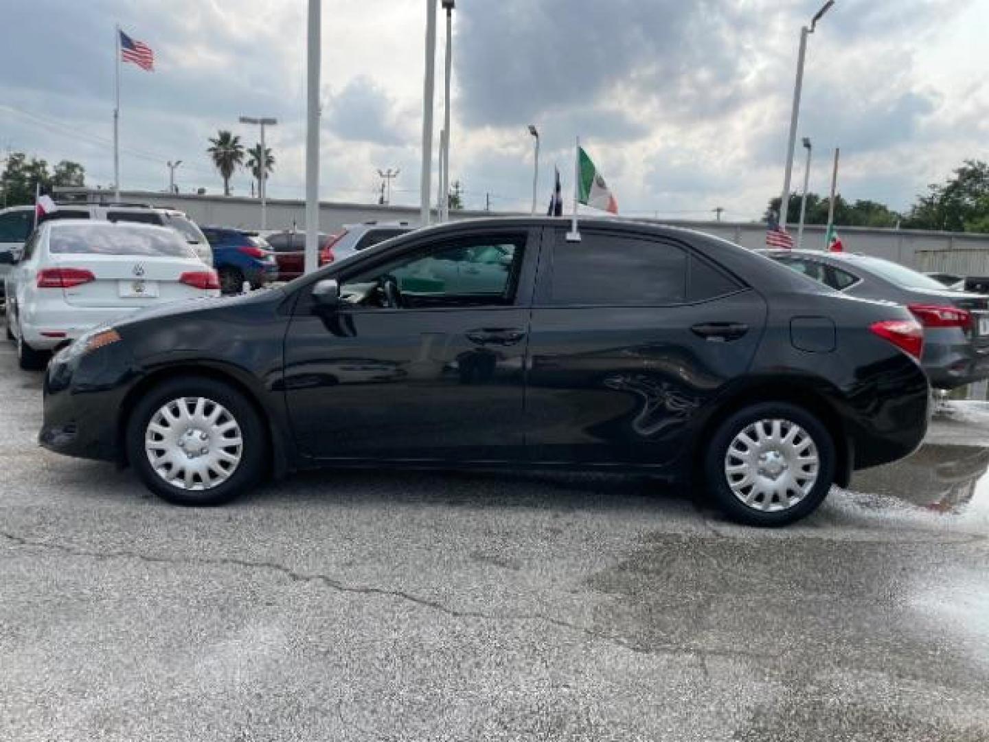 2017 Black Sand Pearl /Black/Brown Fabric, premium cloth Toyota Corolla LE CVT (2T1BURHE3HC) with an 1.8L L4 DOHC 16V engine, Continuously Variable Transmission transmission, located at 4545 Spencer Hwy., Pasadena, 77504, (832) 266-1645, 29.666037, -95.173775 - Photo#2