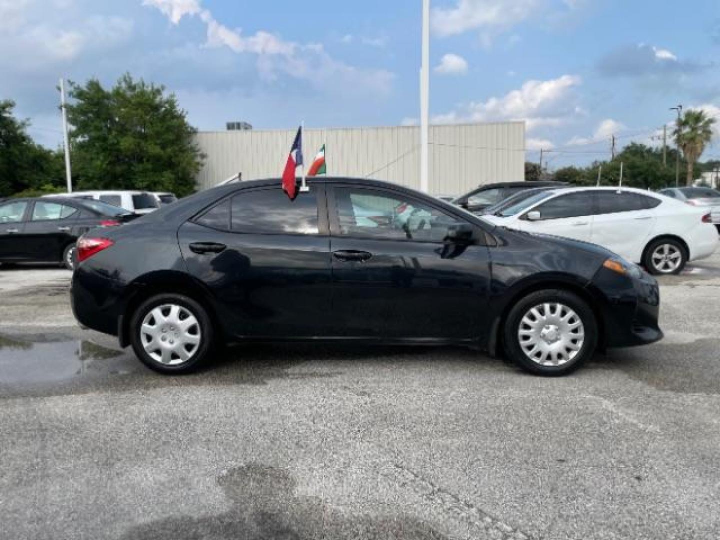 2017 Black Sand Pearl /Black/Brown Fabric, premium cloth Toyota Corolla LE CVT (2T1BURHE3HC) with an 1.8L L4 DOHC 16V engine, Continuously Variable Transmission transmission, located at 4545 Spencer Hwy., Pasadena, 77504, (832) 266-1645, 29.666037, -95.173775 - Photo#3