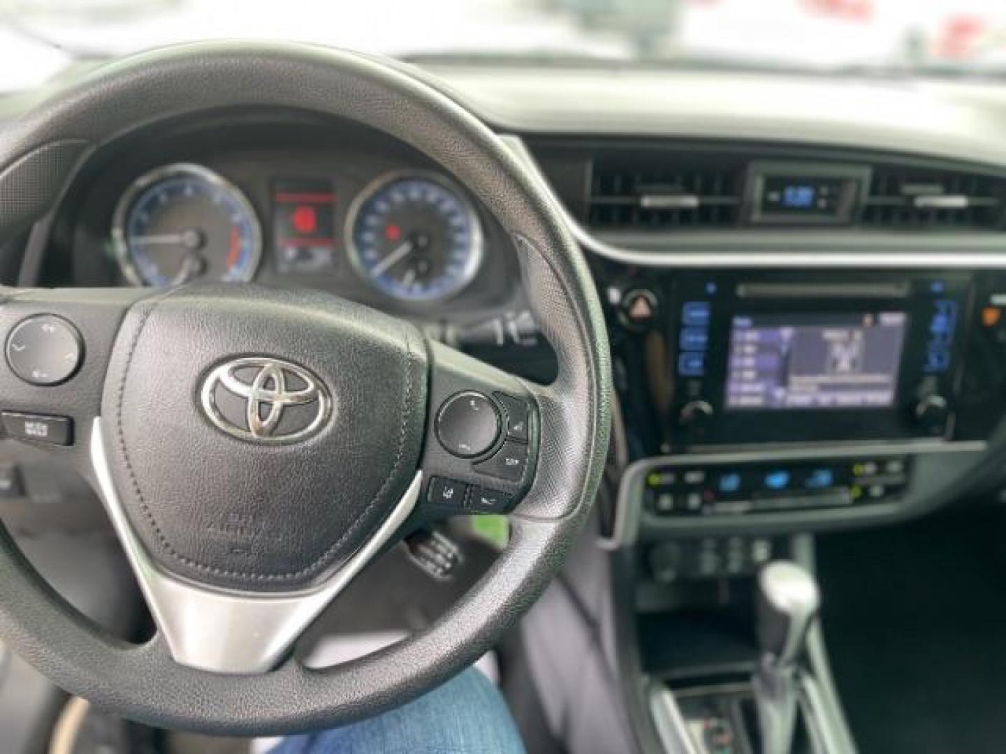 2017 Black Sand Pearl /Black/Brown Fabric, premium cloth Toyota Corolla LE CVT (2T1BURHE3HC) with an 1.8L L4 DOHC 16V engine, Continuously Variable Transmission transmission, located at 4545 Spencer Hwy., Pasadena, 77504, (832) 266-1645, 29.666037, -95.173775 - Photo#8