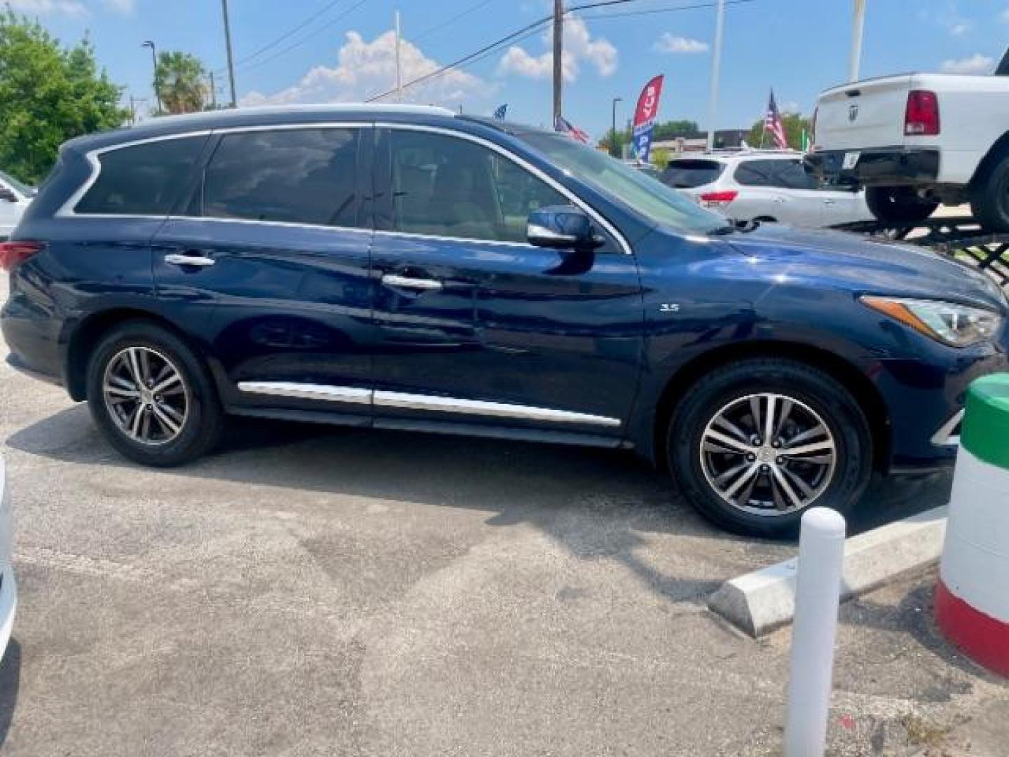 2016 Iridium Blue /High Contrast Wheat, leather Infiniti QX60 Base AWD (5N1AL0MM5GC) with an 3.5L V6 DOHC 24V engine, Continuously Variable Transmission transmission, located at 4545 Spencer Hwy., Pasadena, 77504, (832) 266-1645, 29.666037, -95.173775 - Photo#2