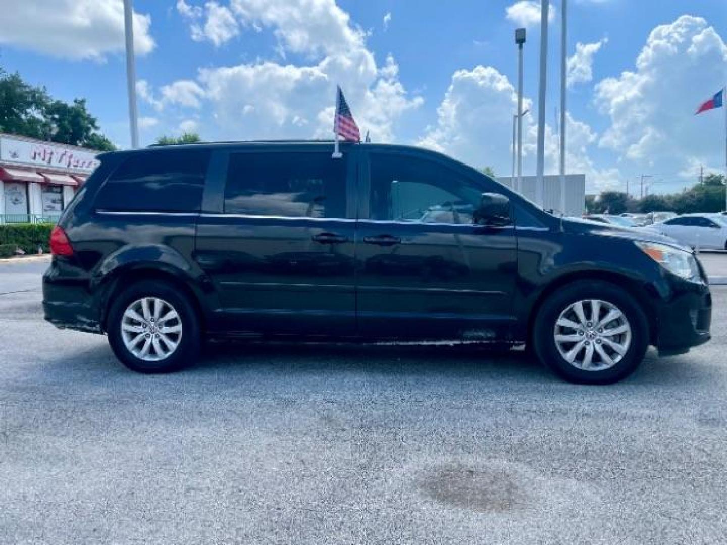 2012 Nocturne Black Metal Volkswagen Routan SE (2C4RVABG0CR) with an 3.6L V6 DOHC 24V engine, 6-Speed Automatic transmission, located at 4545 Spencer Hwy., Pasadena, 77504, (832) 266-1645, 29.666037, -95.173775 - Photo#2