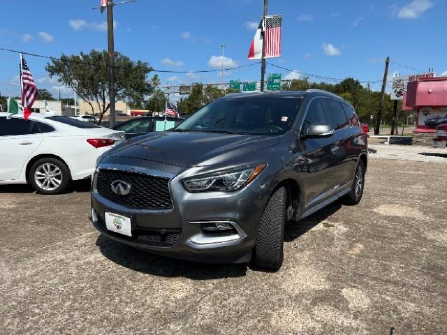 2016 Graphite Shadow /High Contrast Wheat, leather Infiniti QX60 Base FWD (5N1AL0MN0GC) with an 3.5L V6 DOHC 24V engine, Continuously Variable Transmission transmission, located at 7935 Gulf Freeway, Houston, 77017, (832) 266-1645, 29.684393, -95.275665 - Photo#2