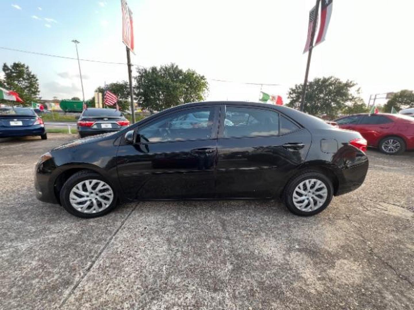 2017 Black Sand Pearl /Ash/Dark Gray Fabric, premium cloth Toyota Corolla LE CVT (5YFBURHE5HP) with an 1.8L L4 DOHC 16V engine, Continuously Variable Transmission transmission, located at 7935 Gulf Freeway, Houston, 77017, (832) 266-1645, 29.684393, -95.275665 - Photo#3