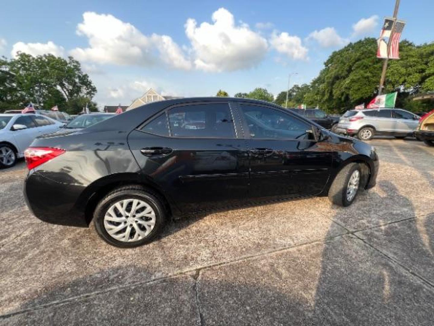 2017 Black Sand Pearl /Ash/Dark Gray Fabric, premium cloth Toyota Corolla LE CVT (5YFBURHE5HP) with an 1.8L L4 DOHC 16V engine, Continuously Variable Transmission transmission, located at 7935 Gulf Freeway, Houston, 77017, (832) 266-1645, 29.684393, -95.275665 - Photo#7