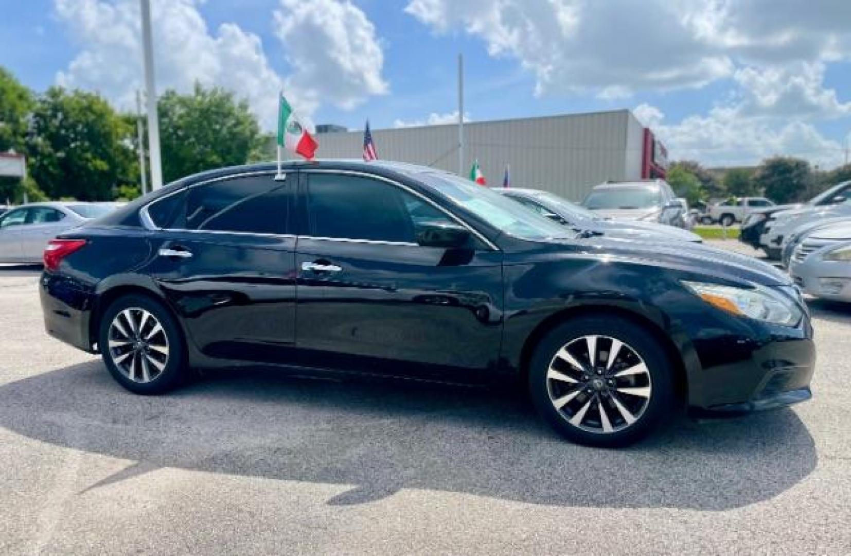 2017 Super Black Nissan Altima 2.5 SV (1N4AL3AP7HC) with an 2.5L L4 DOHC 16V engine, Continuously Variable Transmission transmission, located at 4545 Spencer Hwy., Pasadena, 77504, (832) 266-1645, 29.666037, -95.173775 - Photo#2