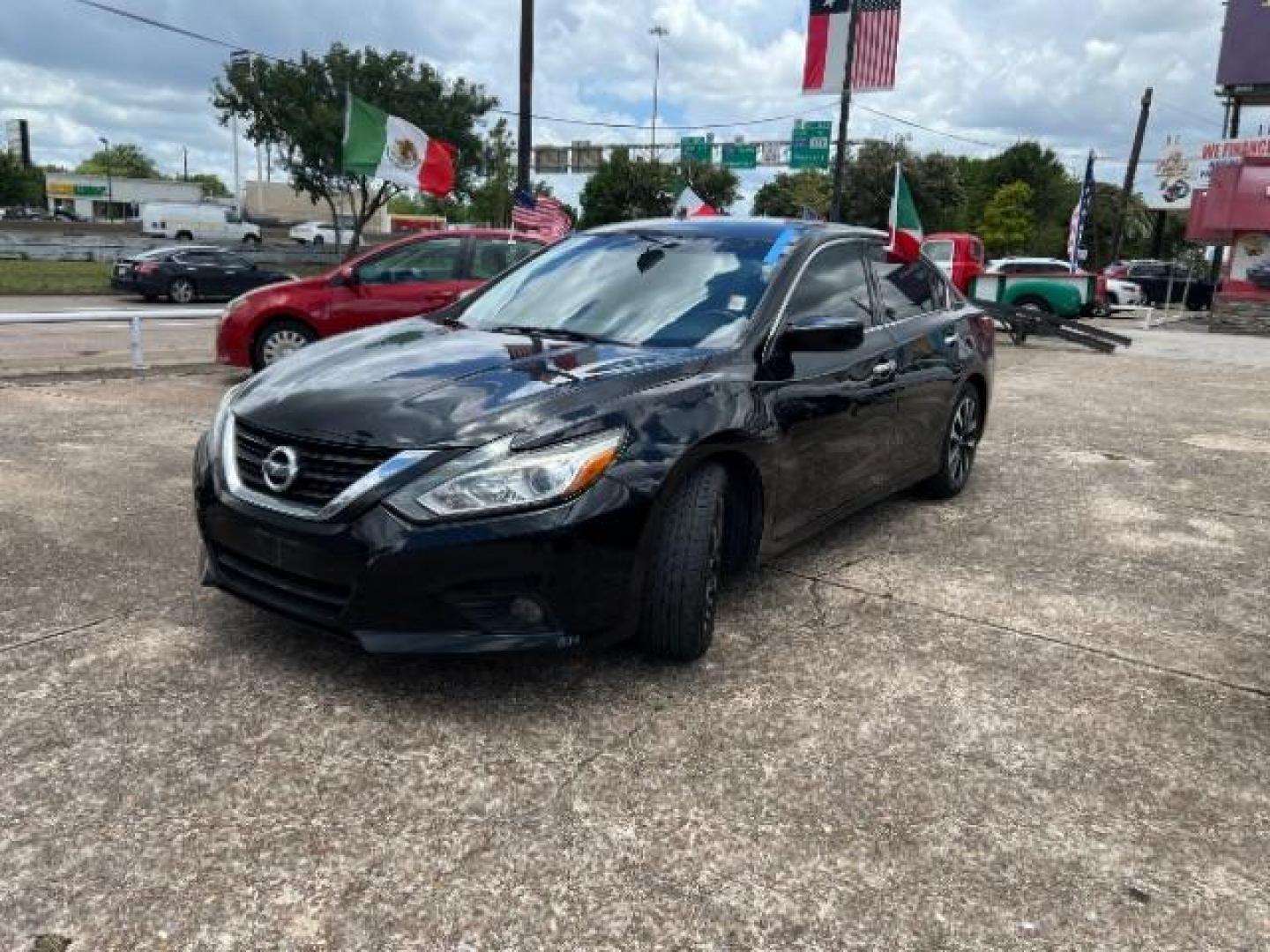 2018 Super Black /Charcoal, cloth Nissan Altima 2.5 SV (1N4AL3AP0JC) with an 2.5L L4 DOHC 16V engine, Continuously Variable Transmission transmission, located at 7935 Gulf Freeway, Houston, 77017, (832) 266-1645, 29.684393, -95.275665 - Photo#2