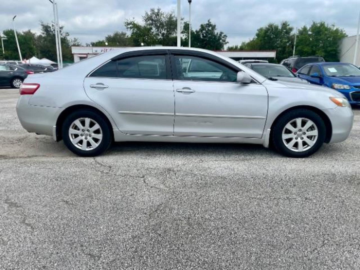 2009 Magnetic Gray /Ash Cloth Interior Toyota Camry XLE 5-Spd AT (4T1BE46K89U) with an 2.4L L4 DOHC 16V engine, 5-Speed Automatic transmission, located at 4545 Spencer Hwy., Pasadena, 77504, (832) 266-1645, 29.666037, -95.173775 - Photo#2