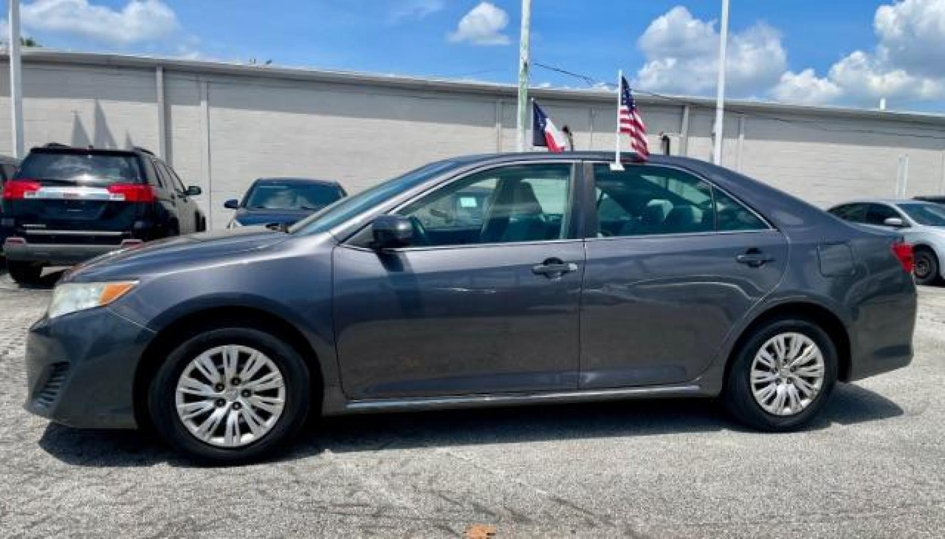 2014 Cosmic Gray Mica /Ash Toyota Camry LE (4T4BF1FK5ER) with an 2.5L L4 DOHC 16V engine, 6-Speed Automatic transmission, located at 4545 Spencer Hwy., Pasadena, 77504, (832) 266-1645, 29.666037, -95.173775 - Photo#0