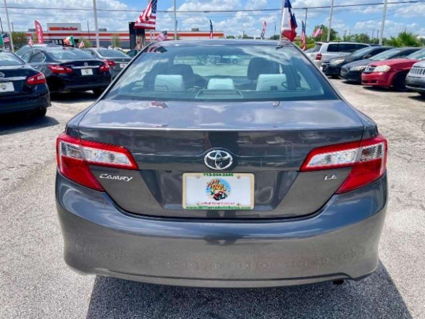 2014 Cosmic Gray Mica /Ash Toyota Camry LE (4T4BF1FK5ER) with an 2.5L L4 DOHC 16V engine, 6-Speed Automatic transmission, located at 4545 Spencer Hwy., Pasadena, 77504, (832) 266-1645, 29.666037, -95.173775 - Photo#3