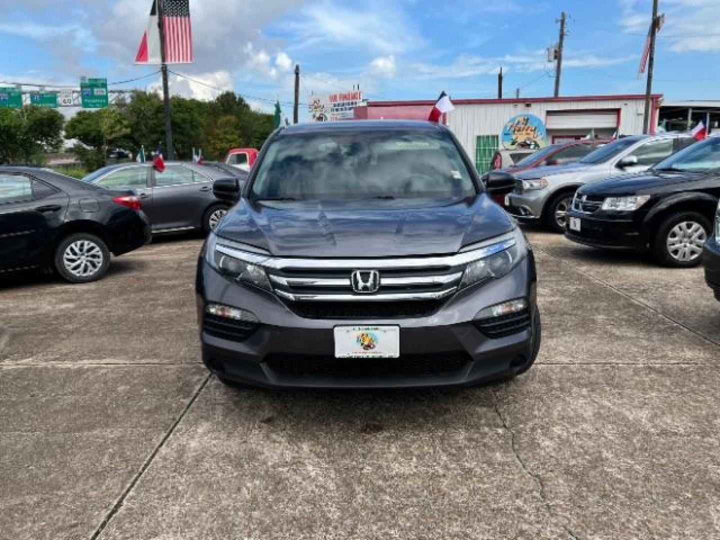 2017 Steel Sapphire Metallic Honda Pilot LX 2WD (5FNYF5H12HB) with an 3.5L V6 SOHC 24V engine, 6-Speed Automatic transmission, located at 7935 Gulf Freeway, Houston, 77017, (832) 266-1645, 29.684393, -95.275665 - Photo#1