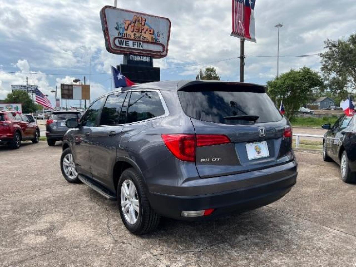 2017 Steel Sapphire Metallic Honda Pilot LX 2WD (5FNYF5H12HB) with an 3.5L V6 SOHC 24V engine, 6-Speed Automatic transmission, located at 7935 Gulf Freeway, Houston, 77017, (832) 266-1645, 29.684393, -95.275665 - Photo#4