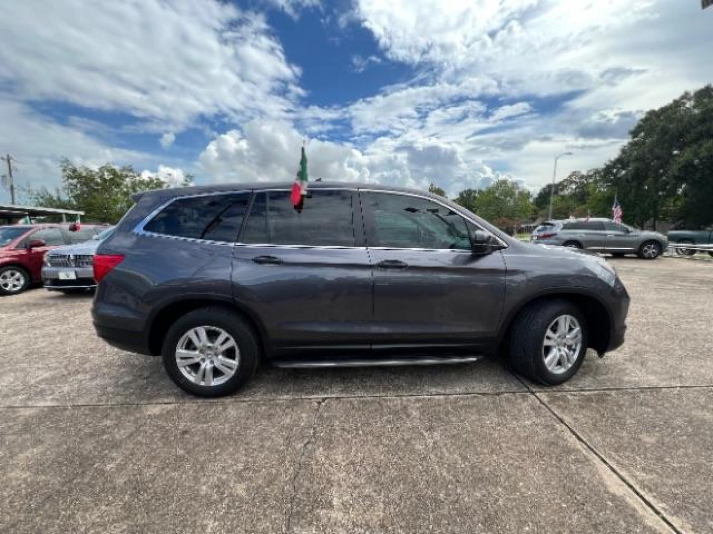 2017 Steel Sapphire Metallic Honda Pilot LX 2WD (5FNYF5H12HB) with an 3.5L V6 SOHC 24V engine, 6-Speed Automatic transmission, located at 7935 Gulf Freeway, Houston, 77017, (832) 266-1645, 29.684393, -95.275665 - Photo#7