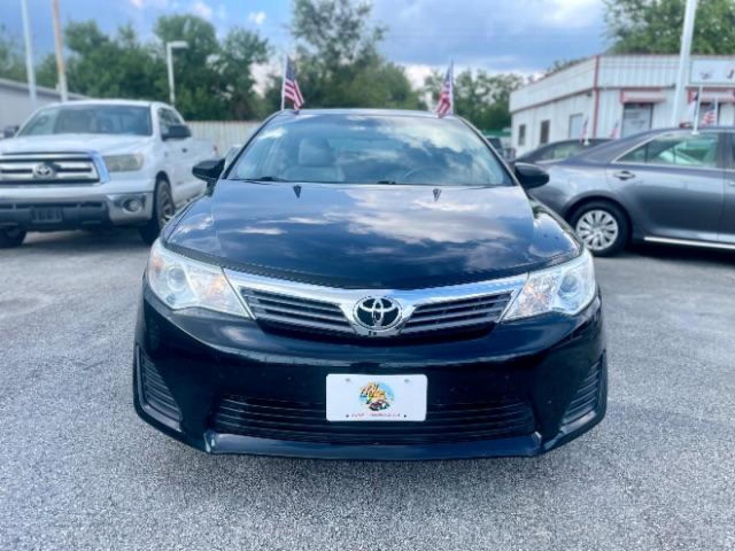 2014 Attitude Black Metallic /Ash Toyota Camry LE (4T4BF1FK6ER) with an 2.5L L4 DOHC 16V engine, 6-Speed Automatic transmission, located at 4545 Spencer Hwy., Pasadena, 77504, (832) 266-1645, 29.666037, -95.173775 - Photo#0