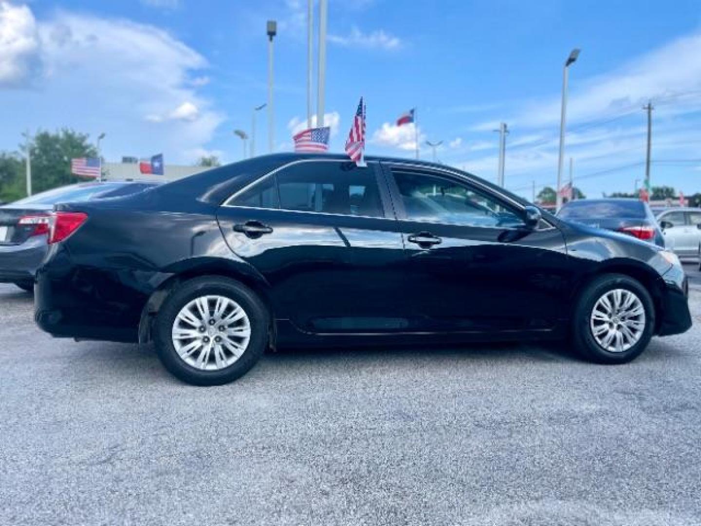 2014 Attitude Black Metallic /Ash Toyota Camry LE (4T4BF1FK6ER) with an 2.5L L4 DOHC 16V engine, 6-Speed Automatic transmission, located at 4545 Spencer Hwy., Pasadena, 77504, (832) 266-1645, 29.666037, -95.173775 - Photo#1