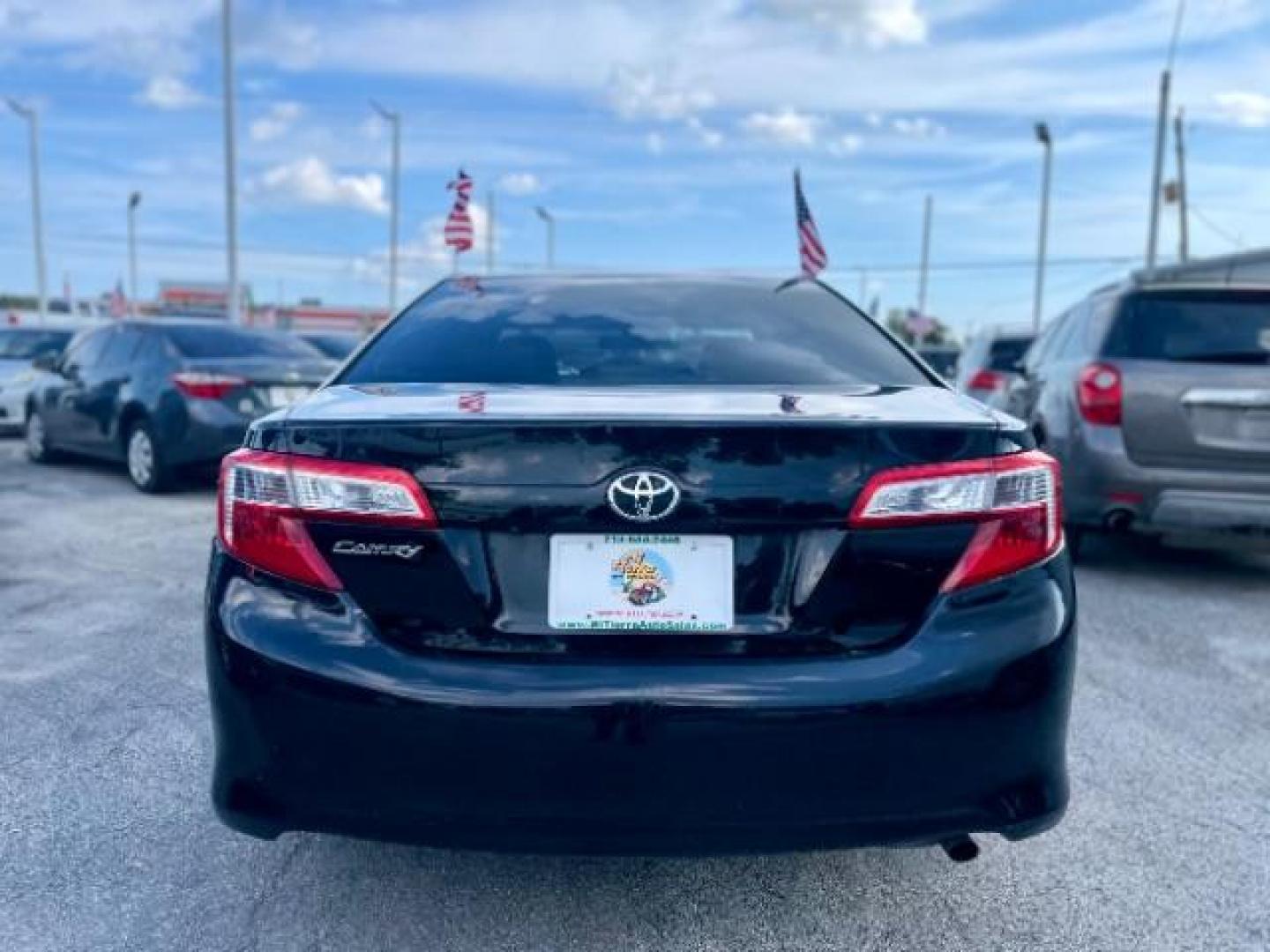 2014 Attitude Black Metallic /Ash Toyota Camry LE (4T4BF1FK6ER) with an 2.5L L4 DOHC 16V engine, 6-Speed Automatic transmission, located at 4545 Spencer Hwy., Pasadena, 77504, (832) 266-1645, 29.666037, -95.173775 - Photo#2