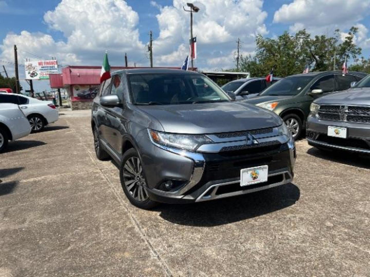 2019 Mercury Gray Metalli /Black, premium cloth Mitsubishi Outlander SE 2WD (JA4AD3A36KZ) with an 2.4L L4 DOHC 16V engine, Continuously Variabl transmission, located at 7935 Gulf Freeway, Houston, 77017, (832) 266-1645, 29.684393, -95.275665 - Photo#0