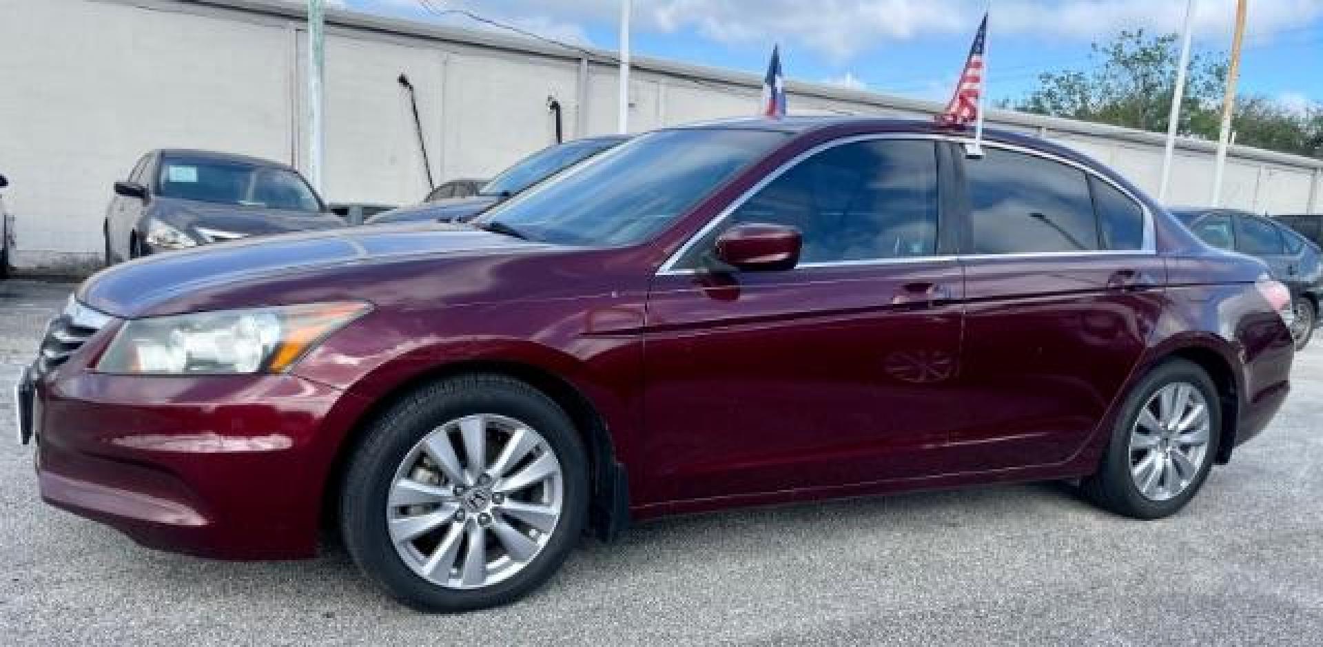 2011 Basque Red Pearl /Ivory Leather Interior Honda Accord EX-L Sedan AT with Navigation (1HGCP2F85BA) with an 2.4L L4 DOHC 16V engine, 5-Speed Automatic transmission, located at 4545 Spencer Hwy., Pasadena, 77504, (832) 266-1645, 29.666037, -95.173775 - Photo#5