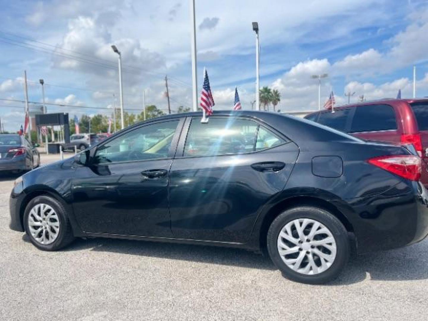 2017 Black Sand Pearl /Ash/Dark Gray Fabric, premium cloth Toyota Corolla LE CVT (2T1BURHE7HC) with an 1.8L L4 DOHC 16V engine, Continuously Variable Transmission transmission, located at 4545 Spencer Hwy., Pasadena, 77504, (832) 266-1645, 29.666037, -95.173775 - Photo#2