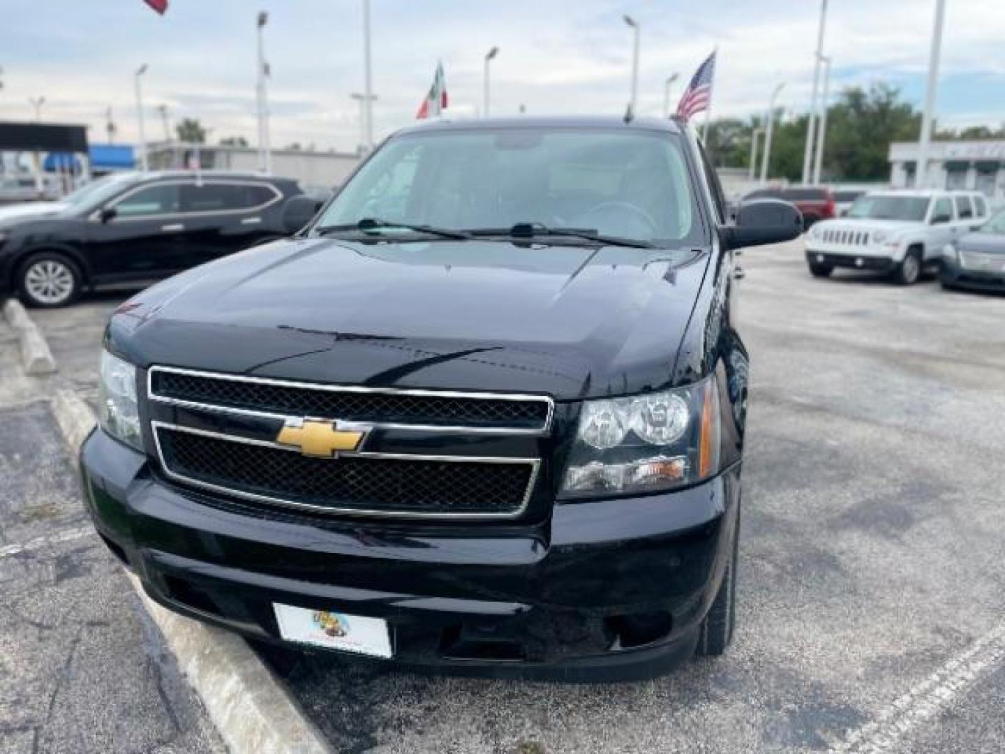 2014 Black Chevrolet Tahoe LS 4WD (1GNSKAE0XER) with an 5.3L V8 OHV 16V FFV engine, 6-Speed Automatic transmission, located at 4545 Spencer Hwy., Pasadena, 77504, (832) 266-1645, 29.666037, -95.173775 - Photo#0