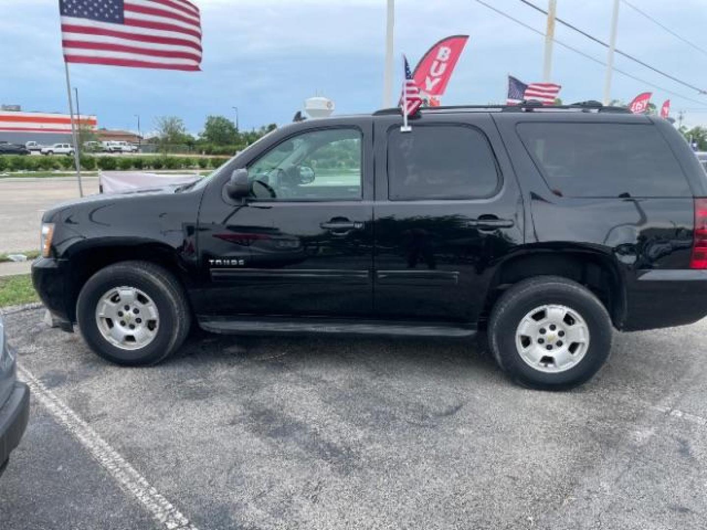 2014 Black Chevrolet Tahoe LS 4WD (1GNSKAE0XER) with an 5.3L V8 OHV 16V FFV engine, 6-Speed Automatic transmission, located at 4545 Spencer Hwy., Pasadena, 77504, (832) 266-1645, 29.666037, -95.173775 - Photo#1