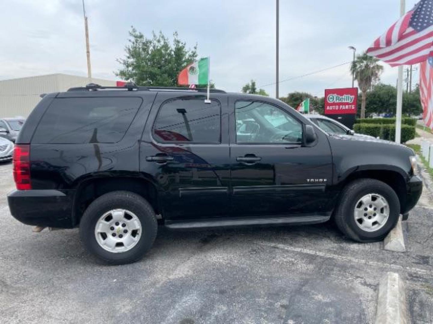 2014 Black Chevrolet Tahoe LS 4WD (1GNSKAE0XER) with an 5.3L V8 OHV 16V FFV engine, 6-Speed Automatic transmission, located at 4545 Spencer Hwy., Pasadena, 77504, (832) 266-1645, 29.666037, -95.173775 - Photo#2