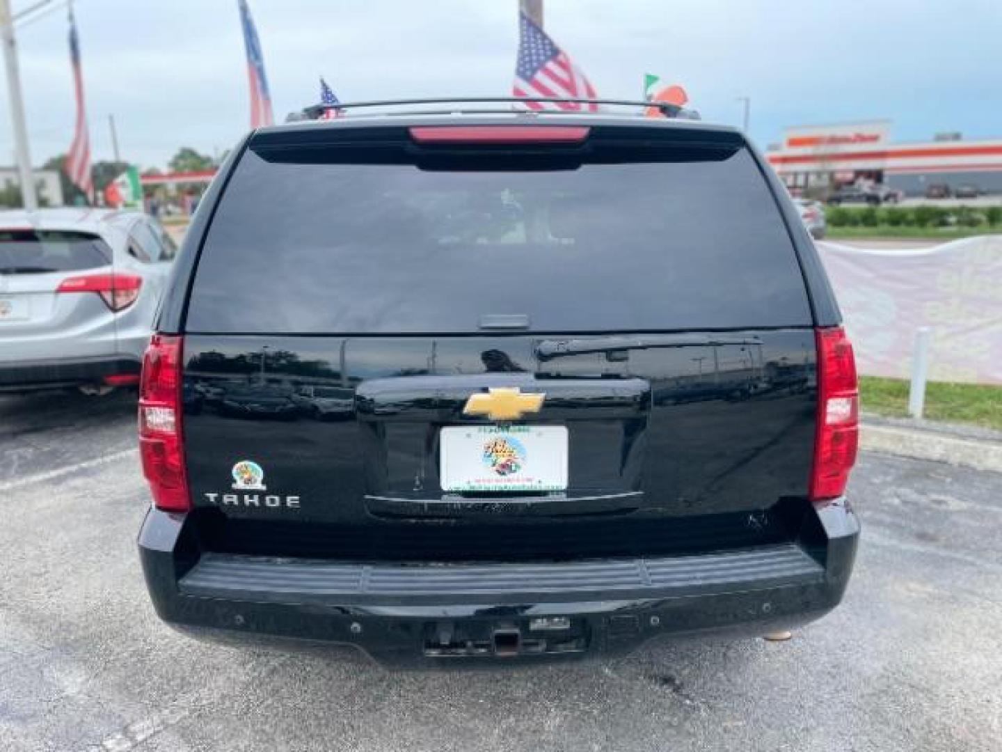 2014 Black Chevrolet Tahoe LS 4WD (1GNSKAE0XER) with an 5.3L V8 OHV 16V FFV engine, 6-Speed Automatic transmission, located at 4545 Spencer Hwy., Pasadena, 77504, (832) 266-1645, 29.666037, -95.173775 - Photo#3