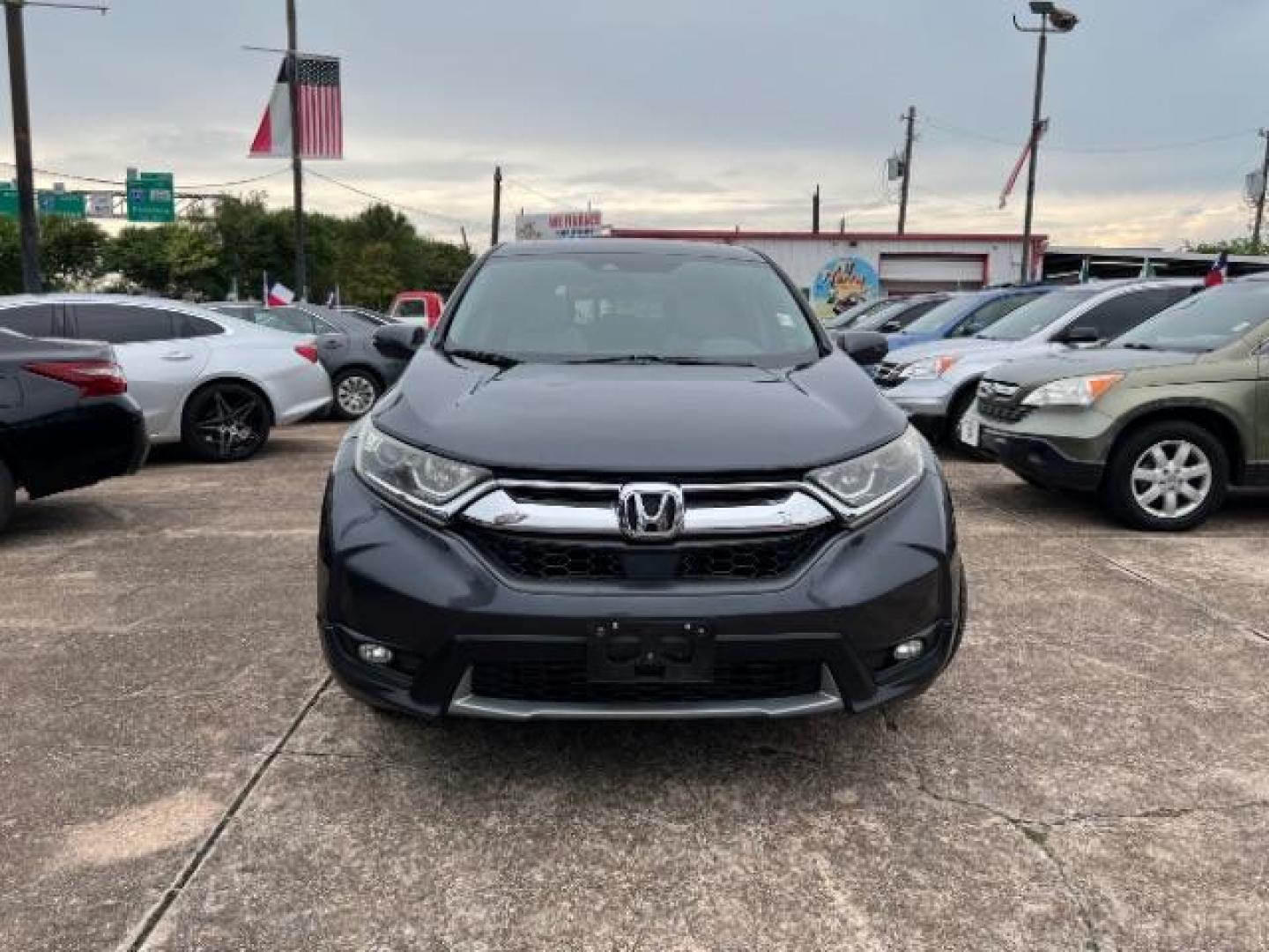 2017 Gunmetal Metallic Honda CR-V EX-L 2WD (7FARW1H88HE) with an 1.5L L4 16V DOHC TURBO engine, Continuously Variable Transmission transmission, located at 7935 Gulf Freeway, Houston, 77017, (832) 266-1645, 29.684393, -95.275665 - Photo#1