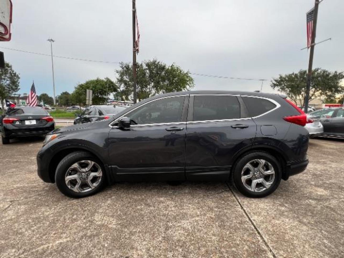 2017 Gunmetal Metallic Honda CR-V EX-L 2WD (7FARW1H88HE) with an 1.5L L4 16V DOHC TURBO engine, Continuously Variable Transmission transmission, located at 7935 Gulf Freeway, Houston, 77017, (832) 266-1645, 29.684393, -95.275665 - Photo#3