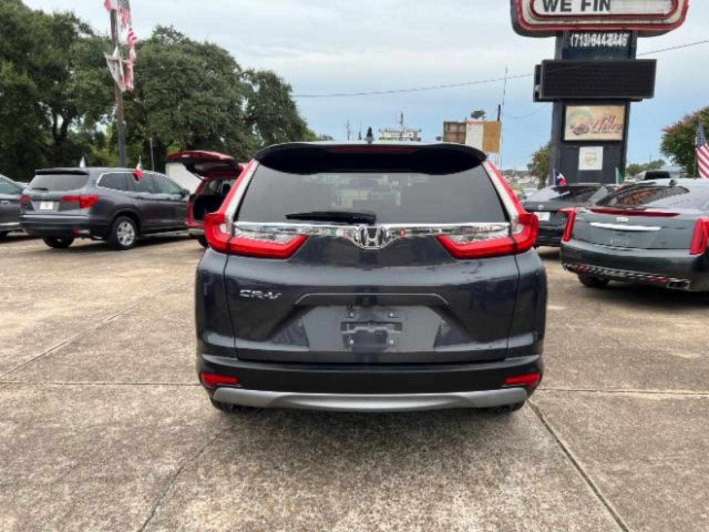 2017 Gunmetal Metallic Honda CR-V EX-L 2WD (7FARW1H88HE) with an 1.5L L4 16V DOHC TURBO engine, Continuously Variable Transmission transmission, located at 7935 Gulf Freeway, Houston, 77017, (832) 266-1645, 29.684393, -95.275665 - Photo#5