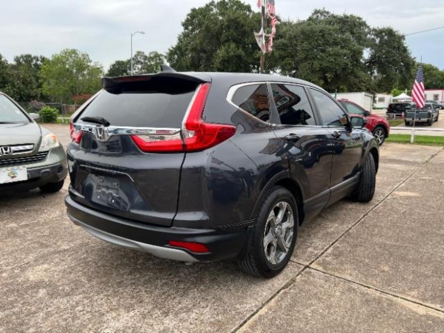 2017 Gunmetal Metallic Honda CR-V EX-L 2WD (7FARW1H88HE) with an 1.5L L4 16V DOHC TURBO engine, Continuously Variable Transmission transmission, located at 7935 Gulf Freeway, Houston, 77017, (832) 266-1645, 29.684393, -95.275665 - Photo#6