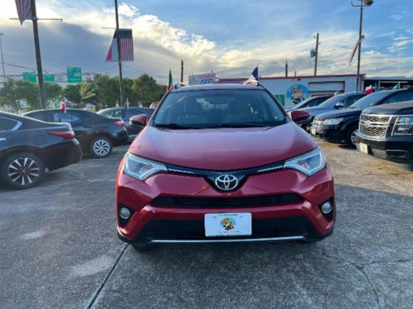 2016 Barcelona Red Metallic Toyota RAV4 XLE FWD (2T3WFREV9GW) with an 2.5L L4 DOHC 16V engine, 6-Speed Automatic transmission, located at 7935 Gulf Freeway, Houston, 77017, (832) 266-1645, 29.684393, -95.275665 - Photo#1