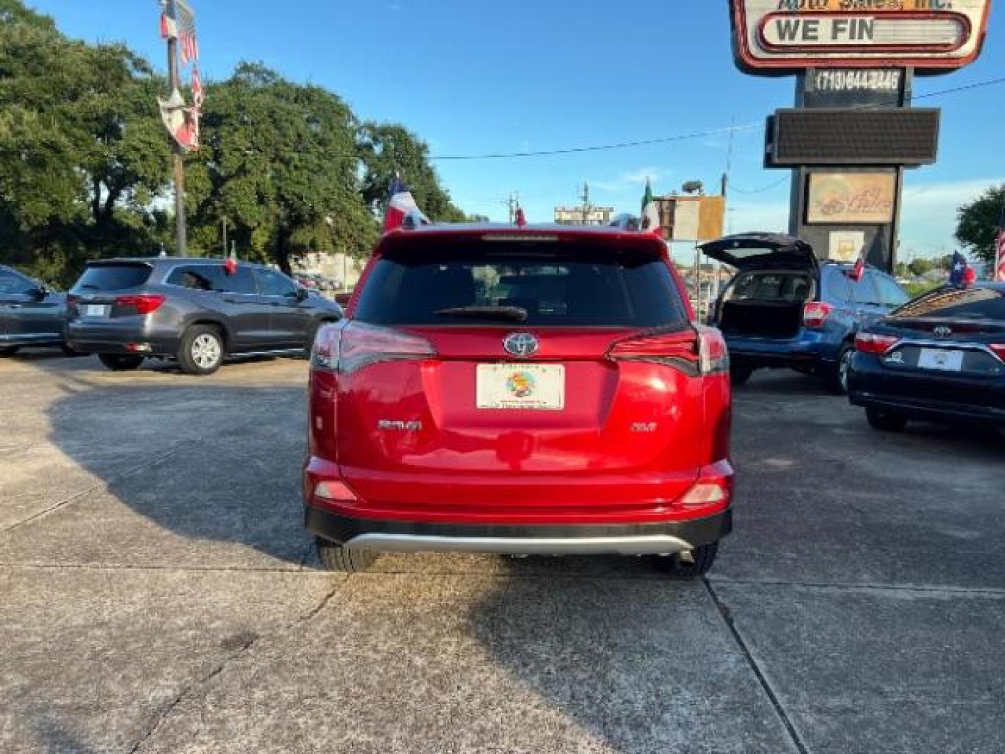 2016 Barcelona Red Metallic Toyota RAV4 XLE FWD (2T3WFREV9GW) with an 2.5L L4 DOHC 16V engine, 6-Speed Automatic transmission, located at 7935 Gulf Freeway, Houston, 77017, (832) 266-1645, 29.684393, -95.275665 - Photo#5