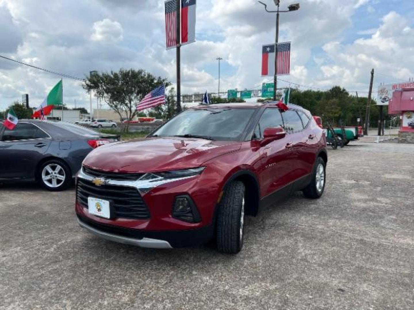 2020 Red Hot Chevrolet Blazer 2LT (3GNKBCR41LS) with an 2.0L L4 DOHC 16 TURBO engine, 9-Speed Automatic transmission, located at 7935 Gulf Freeway, Houston, 77017, (832) 266-1645, 29.684393, -95.275665 - Photo#2